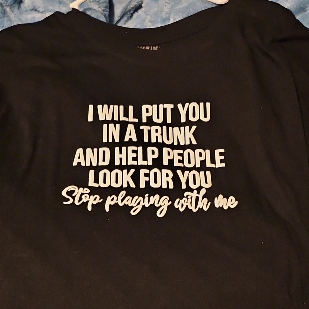 Black Shirt with Bold Statement True Crime